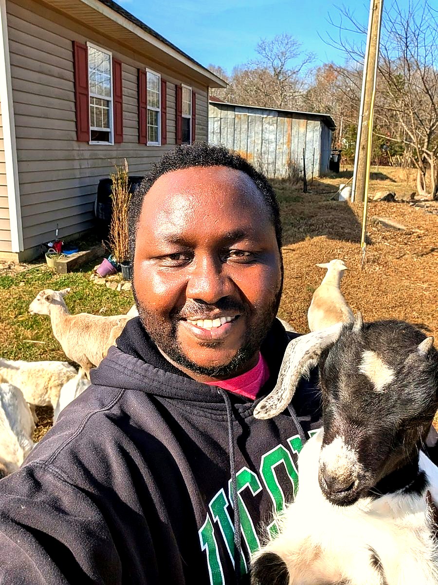 Farmer and goat